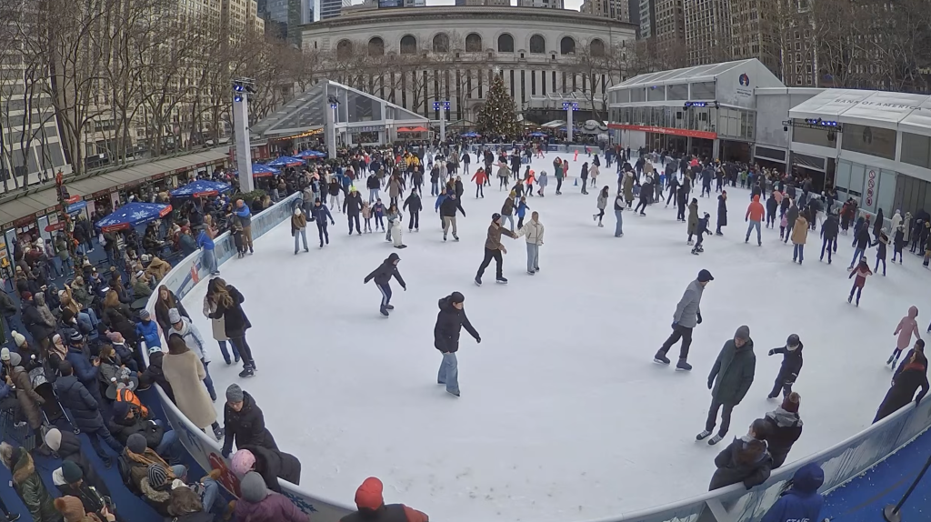 Skaters on outdoor ice rink in New York